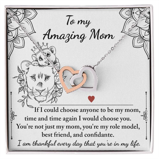 A To Mom, Be My Mom - Interlocking Hearts Necklace adorned with cubic zirconia crystals, presented on a card featuring a lion illustration and a heartfelt message to a mother.