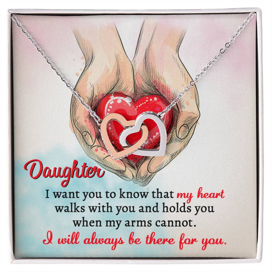 A high quality polished surgical steel necklace with two interlocking hearts is placed over an illustration of hands holding a red heart. Text reads: "Daughter, I want you to know that my heart walks with you and holds you when my arms cannot. I will always be there for you.
Product Name: To Daughter, Always Be There - Interlocking Hearts Necklace.