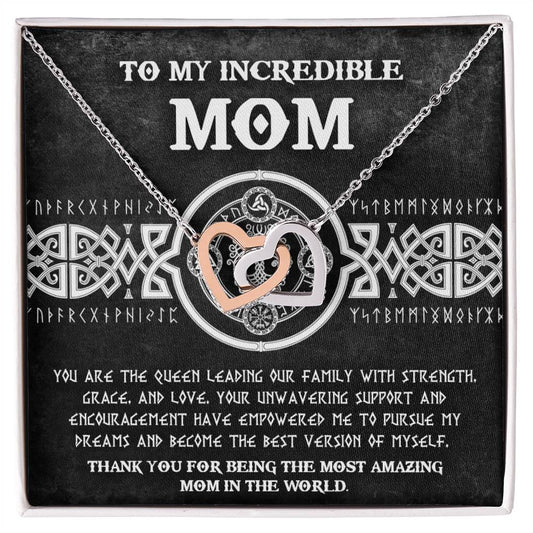 To Mom, The Queen 2 - Interlocking Hearts Necklace with interlocking hearts pendant on a plaque that reads a heartfelt message for "mom" surrounded by Celtic designs.
