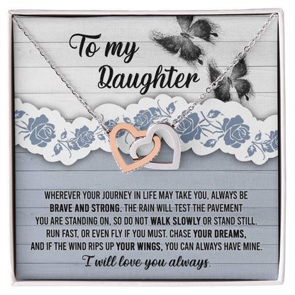 The "To Daughter, Always Have Mine - Interlocking Hearts Necklace," adorned with cubic zirconia crystals, is beautifully presented against a decorative card that inspires bravery, strength, and the pursuit of dreams. The message is addressed "To my Daughter" and concludes with "I will love you always.