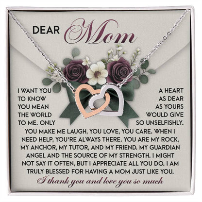 The "Mom-Guardian Angel - Interlocking Hearts Necklace" features a surgical steel necklace with cubic zirconia crystals on a decorative card. The card begins with "Dear Mom," expressing love, gratitude, and appreciation for her support and selflessness.