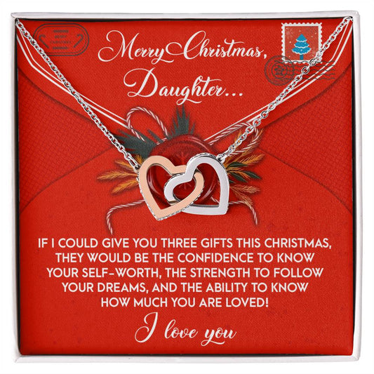 The Daughter-This Christmas - Interlocking Hearts Necklace features an intertwined design with cubic zirconia crystals and comes in a box. The message reads: "Merry Christmas, Daughter... If I could give you three gifts this Christmas... I love you.