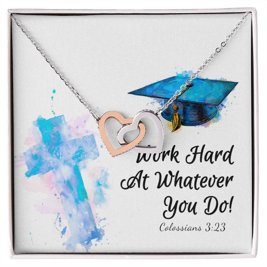 A canvas with a motivational message "work hard at whatever you do!" featuring a Work Hard - Interlocking Hearts Necklace from ShineOn Fulfillment studded with cubic zirconia crystals and a painted graduation cap.