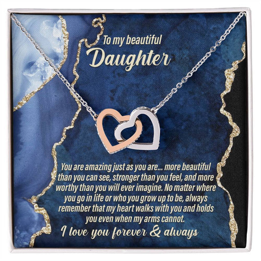 The "To Daughter, As You Are - Interlocking Hearts Necklace" adorned with cubic zirconia crystals comes with a card that says: "To my beautiful daughter. You are amazing just the way you are... I love you forever & always.