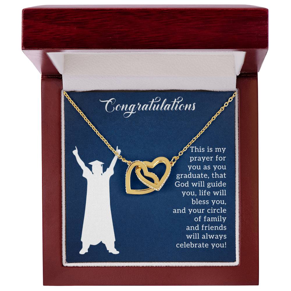 ShineOn Fulfillment's "Prayer For Graduation" Interlocking Hearts Necklace with graduation cap detail, presented in a box with a congratulatory message.