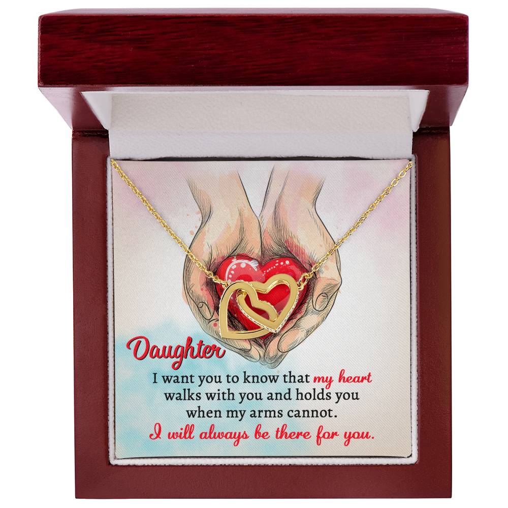 A high quality polished surgical steel necklace with two interlocking hearts is placed over an illustration of hands holding a red heart. Text reads: "Daughter, I want you to know that my heart walks with you and holds you when my arms cannot. I will always be there for you.
Product Name: To Daughter, Always Be There - Interlocking Hearts Necklace.