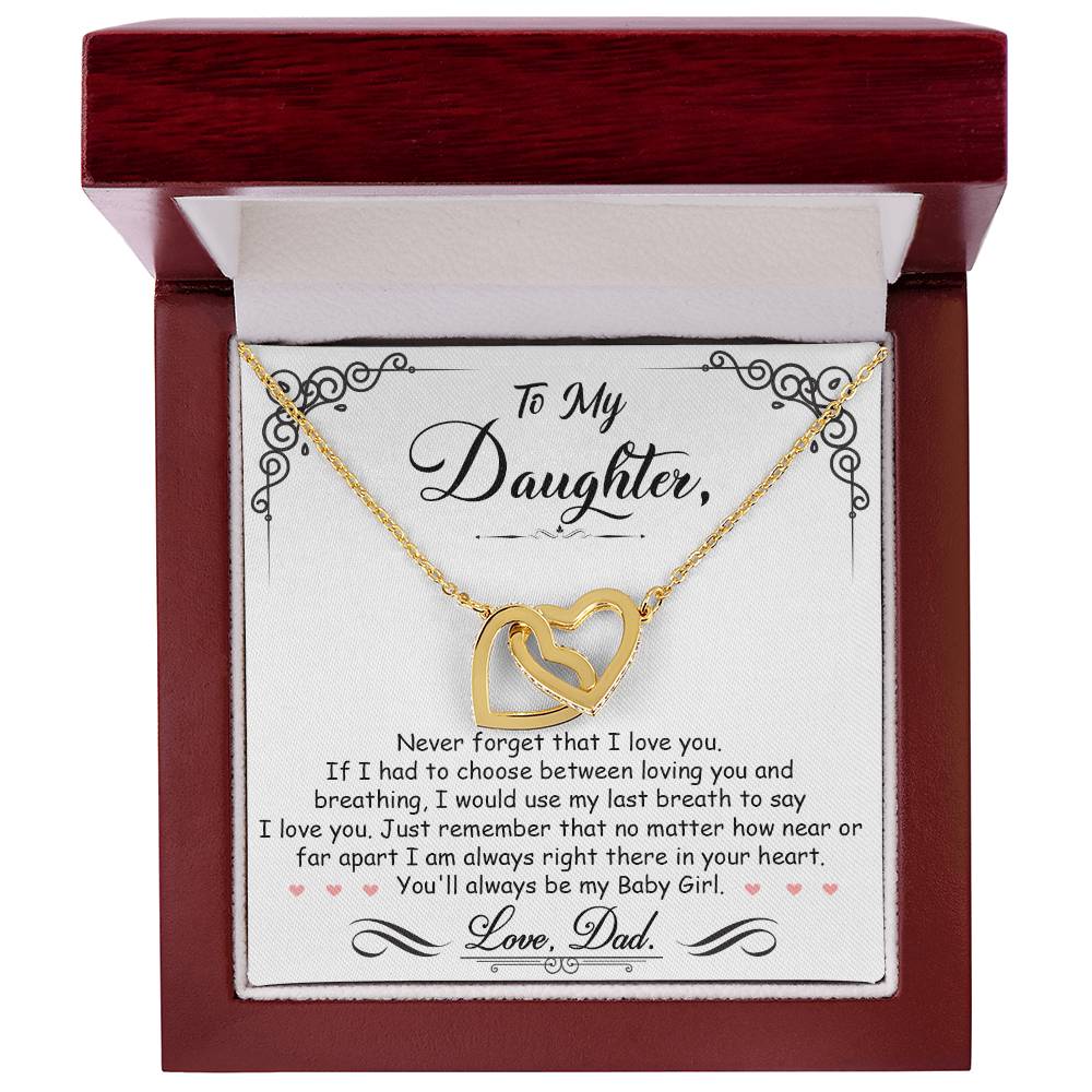 A "To My Daughter, I'm Always Right Here In Your Heart - Interlocking Hearts Necklace" from ShineOn Fulfillment in a gift box featuring a sentimental message to a daughter from her father.