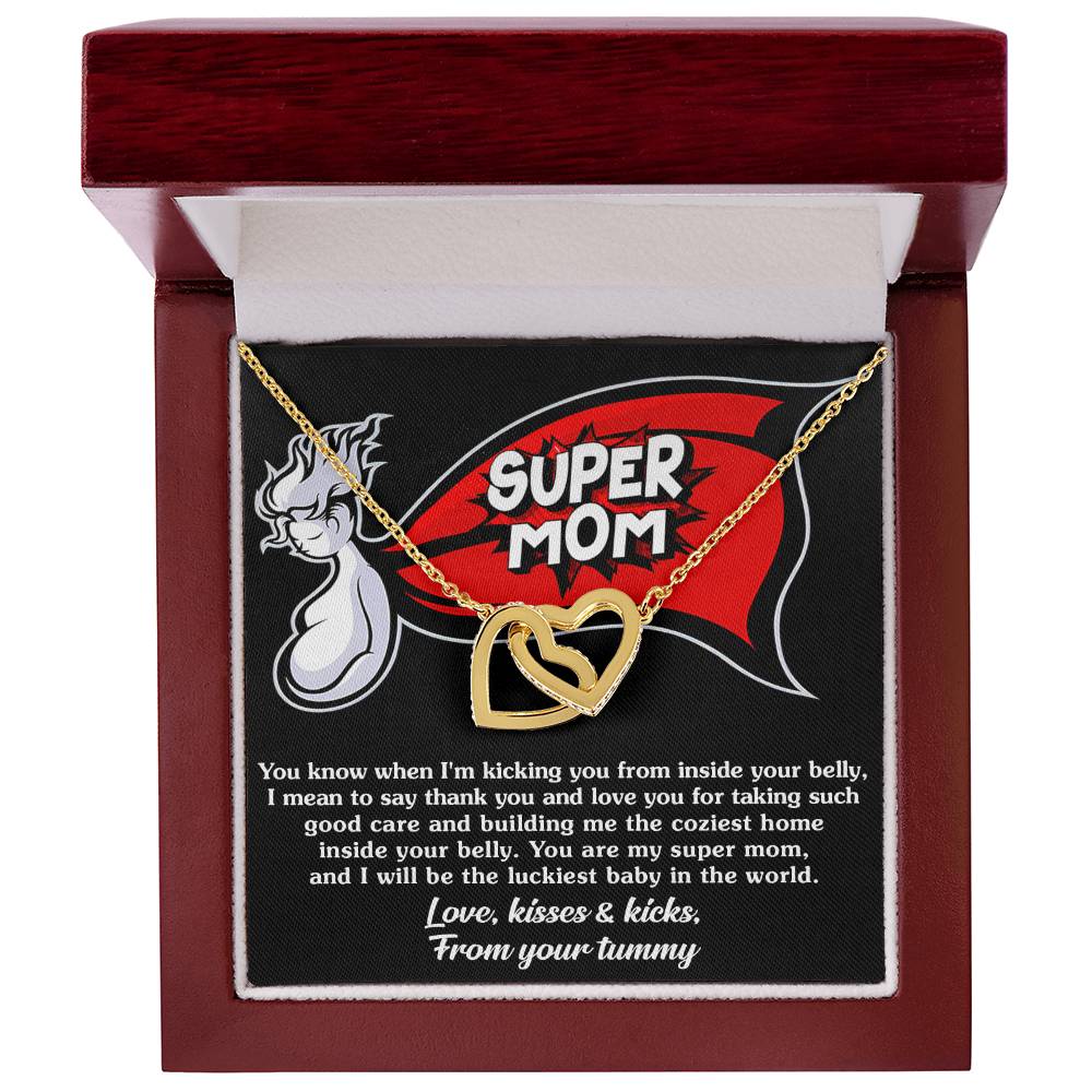 Pendant necklace with 'To Mama To Be, My Super Mom' inscription and heartfelt note from unborn baby, featuring an interlocking hearts design, presented in a red gift box by ShineOn Fulfillment.