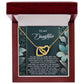 The Daughter-Happiest Person Interlocking Hearts Necklace features cubic zirconia crystals in a gold heart pendant, packaged in a jewelry box with a heartfelt message card for your daughter. It's the perfect gift she'll cherish forever.