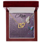 A gold Mom-Shining Star interlocking hearts necklace in a luxury wooden gift box features a heartfelt message of love and gratitude to mom, adorned with colorful butterflies on a purple background, and sparkling with cubic zirconia crystals.
