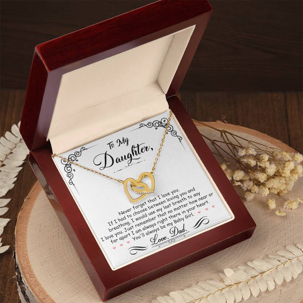 To My Daughter, I_m Always Right Here In Your Heart - Interlocking Hearts Necklace in a gift box with a message from a father to a daughter, adorned with cubic zirconia crystals by ShineOn Fulfillment.