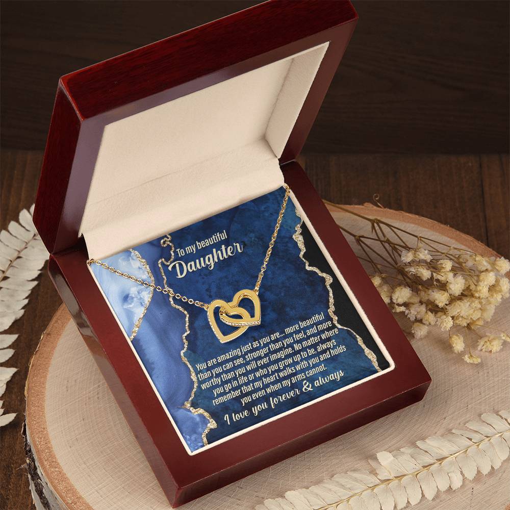 The "To Daughter, As You Are - Interlocking Hearts Necklace" adorned with cubic zirconia crystals comes with a card that says: "To my beautiful daughter. You are amazing just the way you are... I love you forever & always.