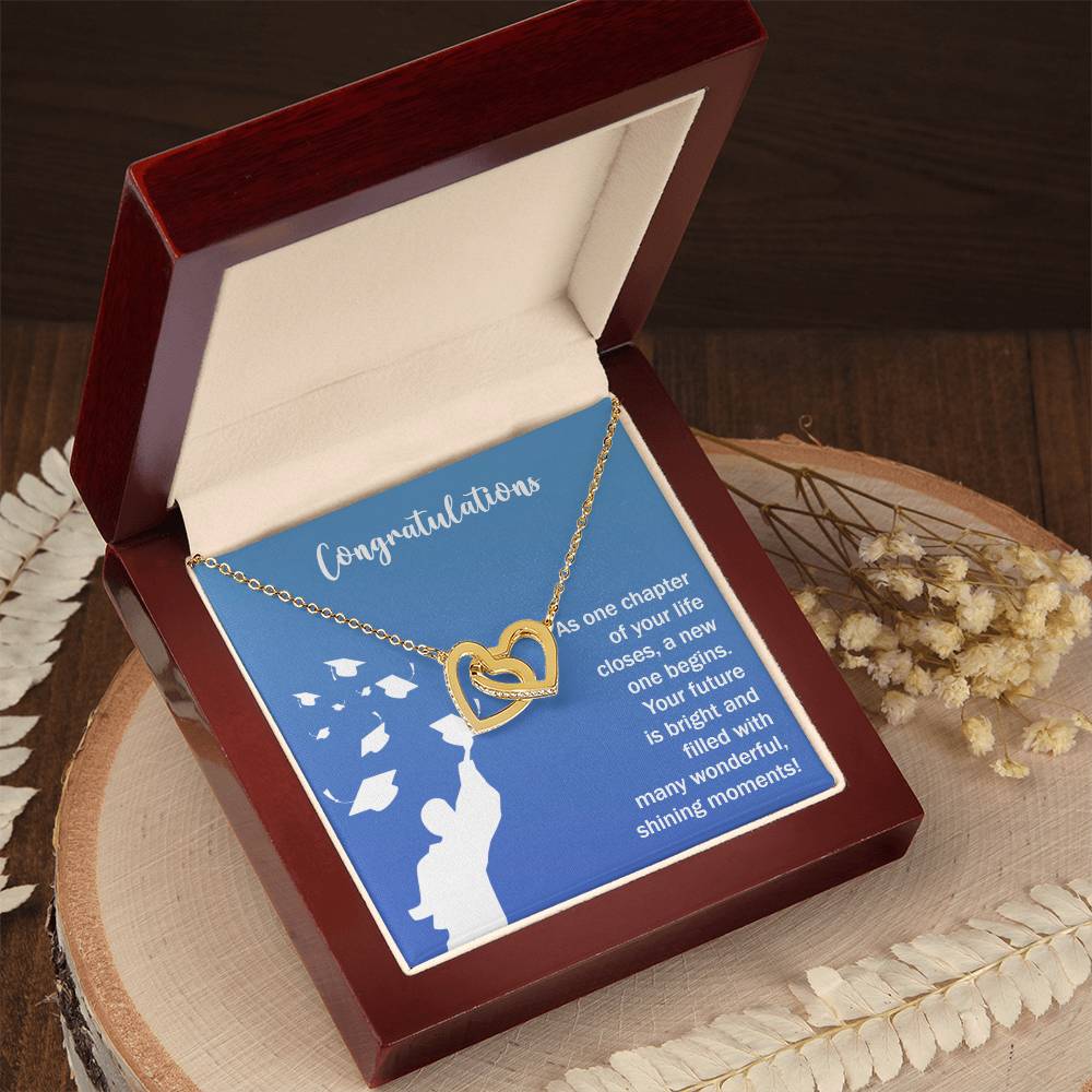 A Future Is Bright - Interlocking Hearts Necklace, adorned with cubic zirconia crystals, in a gift box with a congratulatory message by ShineOn Fulfillment.