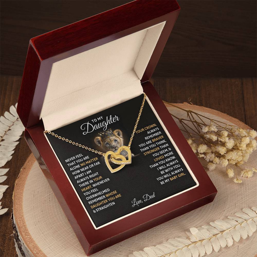 A "To My Daughter, You Will Always Be My Baby Girl" Interlocking Hearts Necklace from ShineOn Fulfillment with a sentimental message to a daughter from a dad, all presented in a gift box.