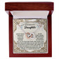 A jewelry box contains the "Daughter-Beautiful And Eternal - Interlocking Hearts Necklace," adorned with sparkling cubic zirconia crystals and a heartfelt message for a daughter inside.