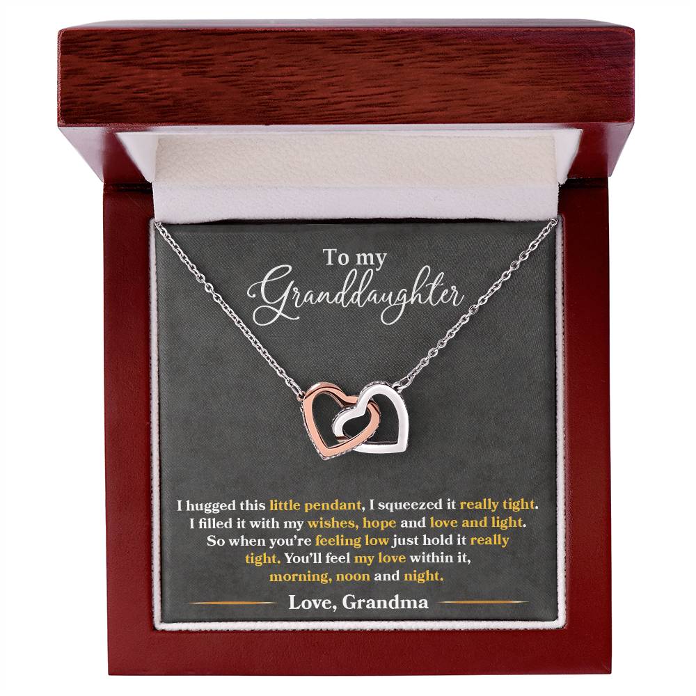 Necklace with interlocking hearts pendant in a gift box featuring a sentimental message from ShineOn Fulfillment to My Granddaughter, You_ll Feel My Love Within This - Interlocking Hearts Necklace.