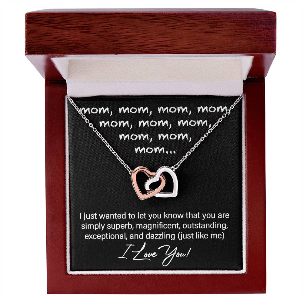 The To Mom, Just Like Me - Interlocking Hearts Necklace, with sparkling cubic zirconia crystals, is elegantly boxed. It features the heartfelt message: “mom” repeatedly and “I just wanted to let you know that you are simply superb...I Love You!” It's the perfect personalized gift.