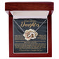 The Daughter-Infinite Love - Interlocking Hearts Necklace, adorned with cubic zirconia crystals, is displayed in an open red box. Inside, a message starts with "To My Lovely Daughter" in elegant script, conveying heartfelt love and support.