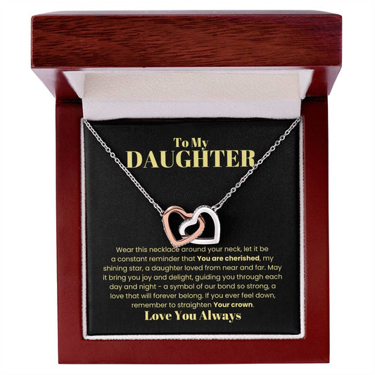 A [Almost Sold Out] To My Daughter, Wear This Necklace - Interlocking Hearts Necklace in a box, inscribed with a sentimental message to a daughter, reminding her of love and strength.