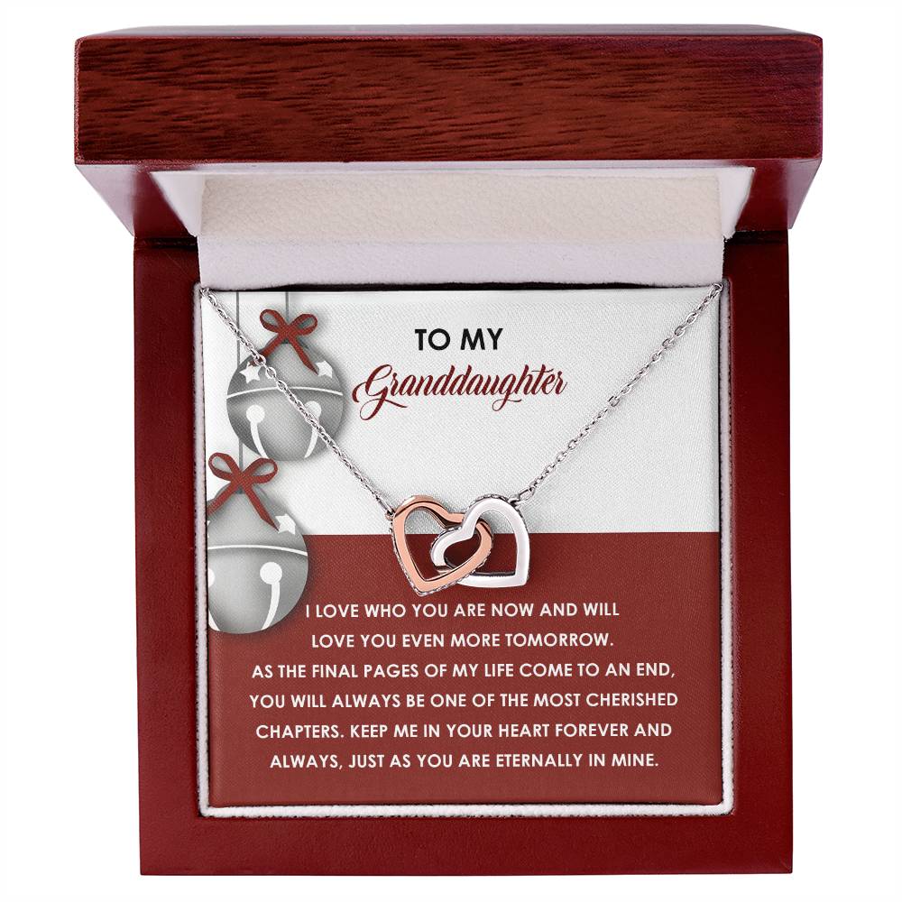 The Granddaughter-To An End - Interlocking Hearts Necklace is elegantly presented in a box, with dazzling cubic zirconia crystals. Made from surgical steel with a rose gold finish, it comes with a touching message to a granddaughter about love and treasured memories.