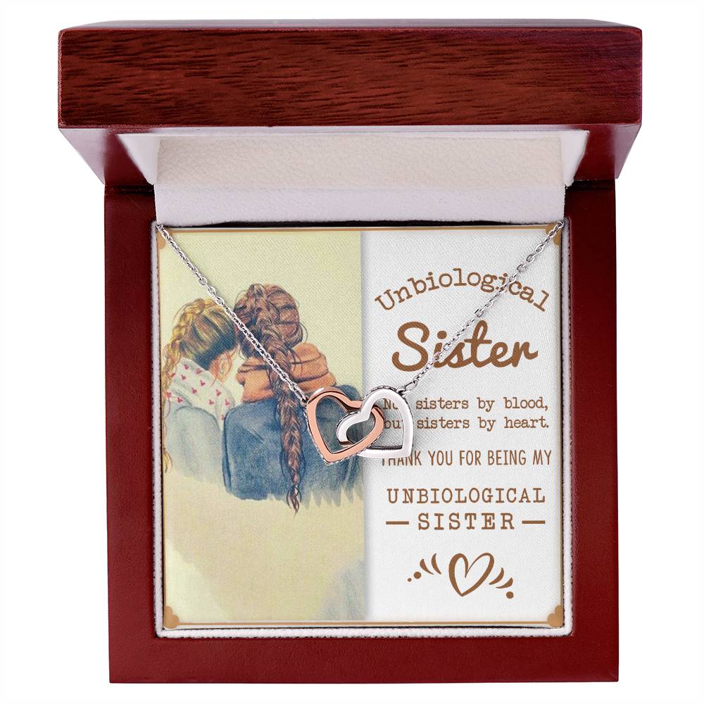 A To My Unbiological Sister, Sisters By Heart - Interlocking Hearts Necklace in a gift box with a message for an 'unbiological sister' by ShineOn Fulfillment.