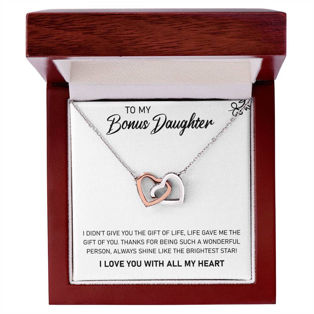 A ShineOn Fulfillment silver necklace with interlocking hearts and cubic zirconia crystals in a gift box featuring a sentimental message for a stepdaughter.
