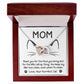 The "Cat Mom-When I'm Mean" Interlocking Hearts Necklace features a rose gold finish and shimmering cubic zirconia crystals, presented in a red and white box. The lid says "MOM," with a message from a cat thanking her for food, catnip, and a clean litter box—an ideal gift.