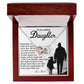 The Daughter-Smile More - Interlocking Hearts Necklace, decorated with cubic zirconia crystals, comes in a wooden box featuring a heartfelt message from dad to daughter to smile and feel supported, along with a touching silhouette of them holding hands.