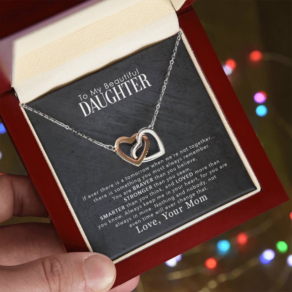A ShineOn Fulfillment "To My Beautiful Daughter, You Are Braver Than You Believe - Interlocking Hearts Necklace" in a gift box with an affectionate message from a mother to her daughter.