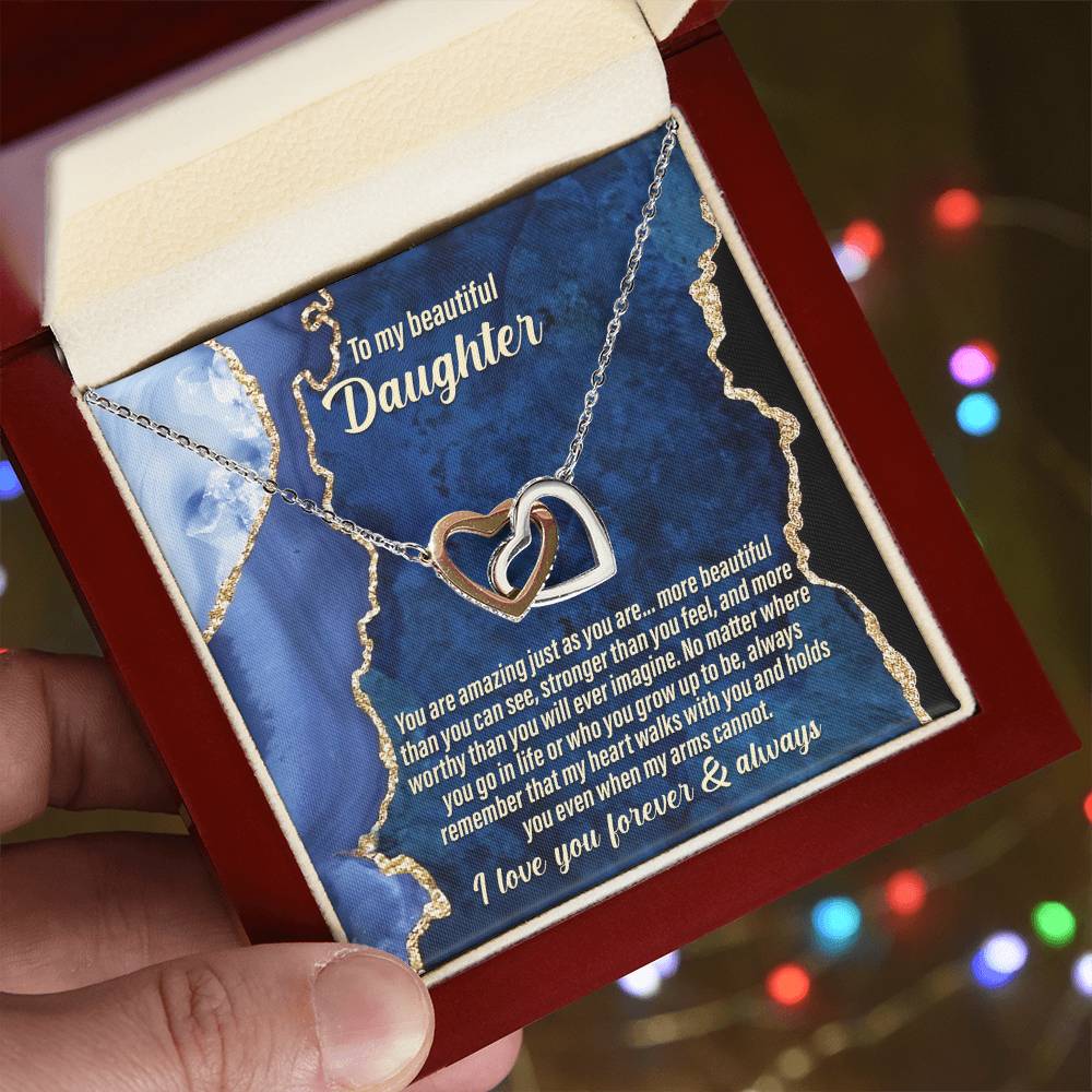 The "To Daughter, As You Are - Interlocking Hearts Necklace" adorned with cubic zirconia crystals comes with a card that says: "To my beautiful daughter. You are amazing just the way you are... I love you forever & always.