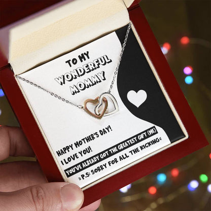 A person holding a jewelry gift box with a sentimental mother's day message and a To Mom To Be, The Greatest Gift - Interlocking Hearts Necklace inside from ShineOn Fulfillment.