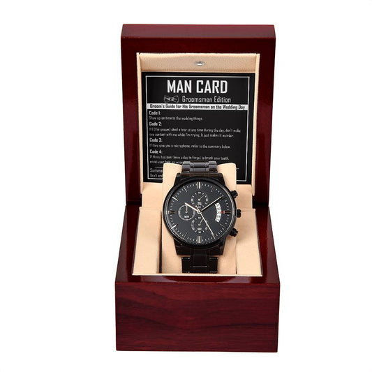 A "To Groomsman, Man Card - Metal Chronograph Watch" featuring a luxury copper dial, elegantly presented in a wooden box with the "Man Card: Groomsmen Edition" guide displayed on the inside lid.