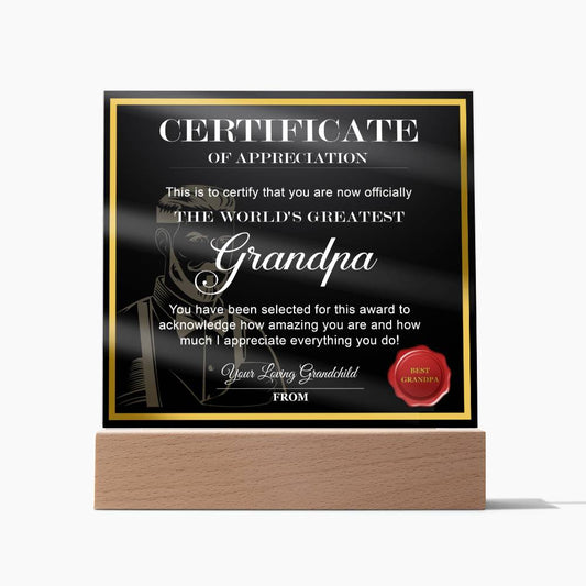A sentimental gift for the world's greatest grandpa: "To Grandpa, World's Greatest Grandpa - Acrylic Square Plaque" on an LED wooden base, featuring a red seal that states "Best Grandpa" and space for a personalized message from the grandchild.
