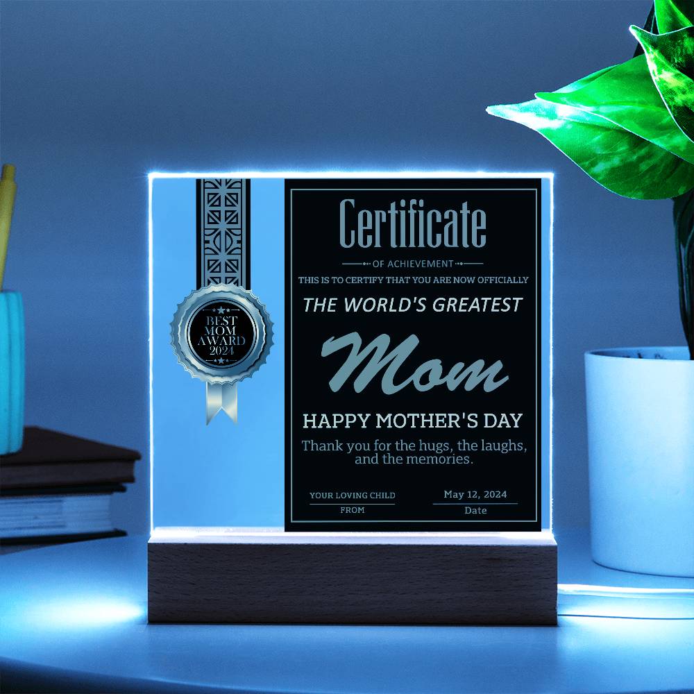 A mother's day certificate in a frame with a gold seal, labeled "world's greatest mom" on an LED wooden base, dated May 12, 2024.