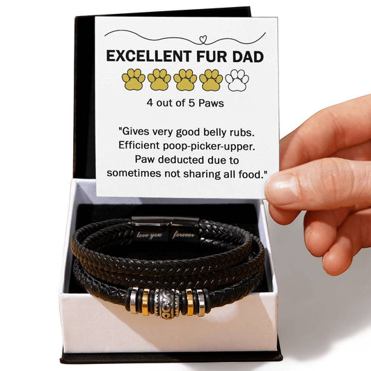 A hand holds a card rating "EXCELLENT FUR DAD: 4 out of 5 Paws." The card praises belly rubs and poop picking but notes a paw deduction for not sharing all food. Below, a To Fur Dad, Sharing All Food - Love You Forever Bracelet completes the picture.