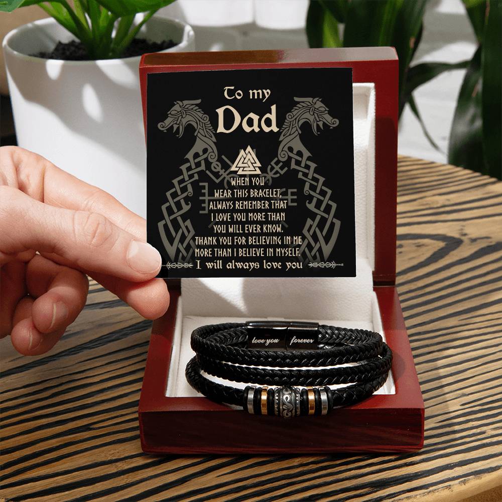 A hand presenting a gift box containing the "To Dad, Will Ever Know - Love You Forever" bracelet with a sentimental note titled "to my dad" inside the lid.
