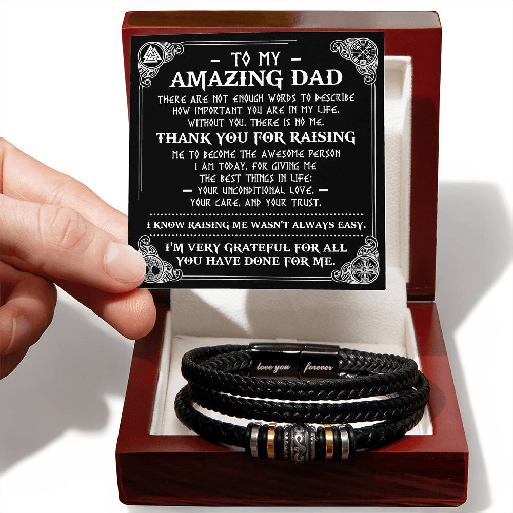 A hand presenting the "To Dad, The Best Things - Love You Forever Bracelet" in front of a card titled "to my dad" with a heartfelt message, against a white background.