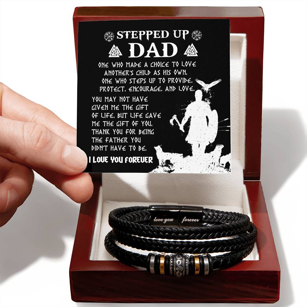 A heartfelt gift box containing a To Step Dad, As His Own - Love You Forever Bracelet with metal beads and a card above that reads "stepped up dad," highlighting appreciation for a stepfather.
