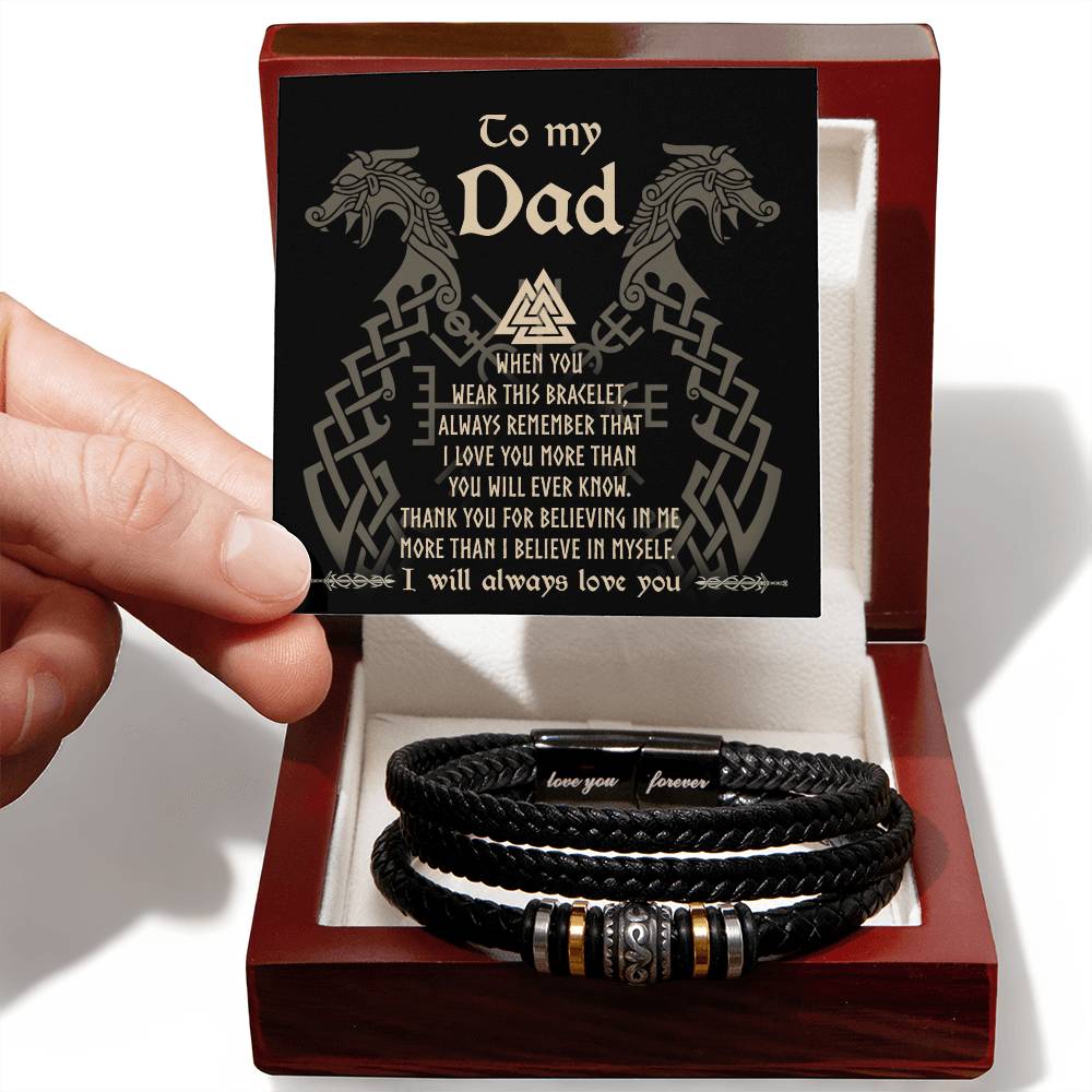A hand presenting a gift box containing the "To Dad, Will Ever Know - Love You Forever" bracelet with a sentimental note titled "to my dad" inside the lid.