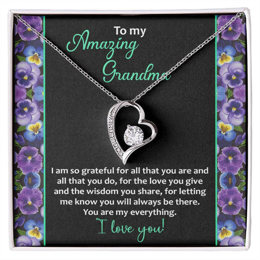 A To Grandma, My Everything - Forever Love Necklace with a heart pendant in a gift box, featuring a message for a grandmother surrounded by a floral pattern.