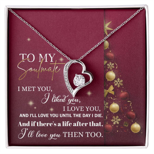 The Soulmate-Love You Then - Forever Love Necklace, featuring a gold finish set against a red background, is beautifully inscribed with "To my soulmate, I met you, I liked you, I love you, and I'll love you until the day I die," and adorned with shimmering CZ crystals.