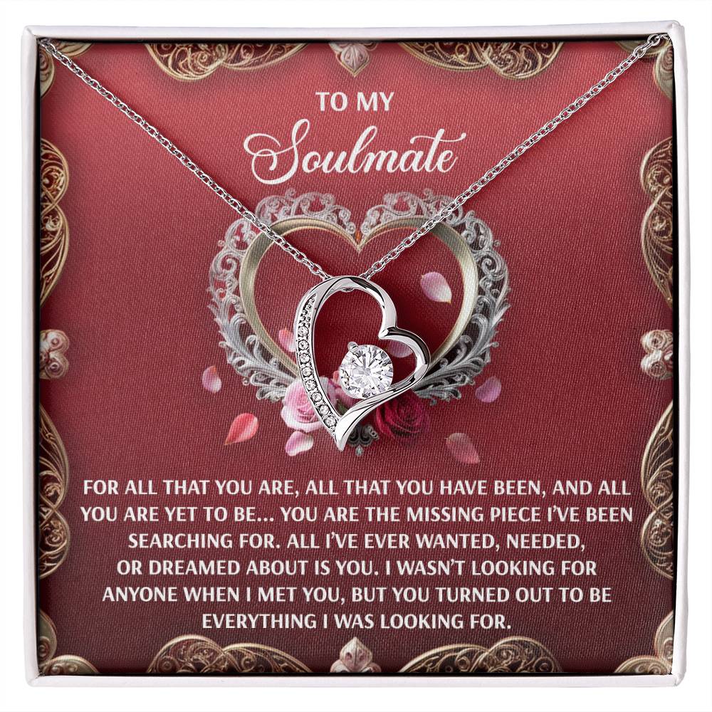 The "Soulmate-I Met You - Forever Love Necklace" is a silver heart necklace featuring a CZ crystal pendant on a decorative card with a romantic message to your soulmate.