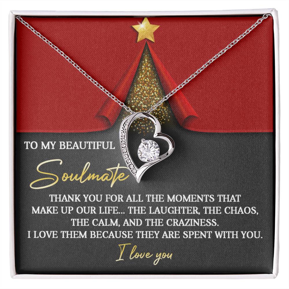 The Soulmate-The Moments - Forever Love Necklace, featuring a heart-shaped design and adorned with a cubic zirconia crystal, comes in a gift box with the heartfelt message: "To my beautiful soulmate. Thank you for all the moments... I love you." Its elegant gold finish enhances its timeless elegance.