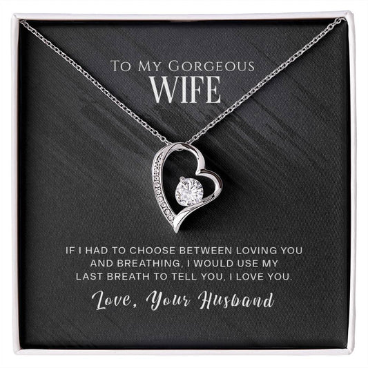 A heart-shaped ShineOn Fulfillment Forever Love Necklace with a gold finish and an affectionate message from a husband to his wife.