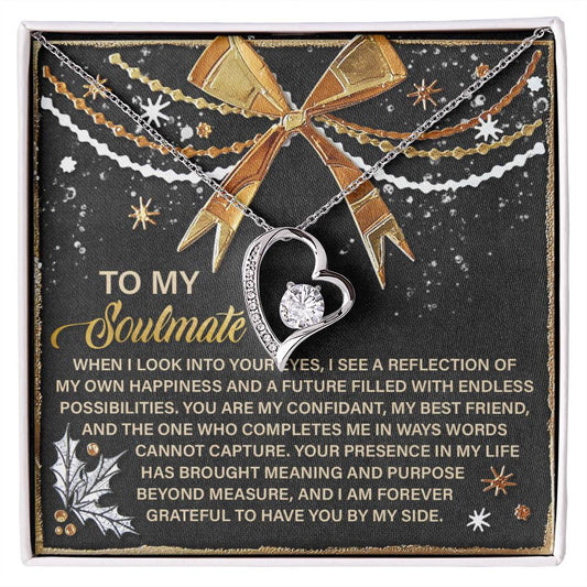 The Soulmate-By My Side - Forever Love Necklace showcases a heart-shaped pendant embellished with cubic zirconia, elegantly presented on a decorative card that includes a sentimental message. This beautiful gold-finished piece serves as a treasured keepsake.