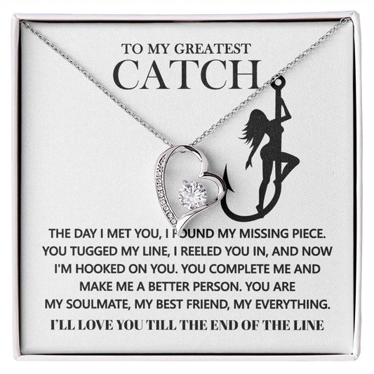 Explore the Soulmate-Hooked On You - Forever Love Necklace, a heart-shaped pendant with a gold finish. Featuring "To my greatest catch," it displays an angler's silhouette and a romantic poem engraved in CZ crystal, symbolizing love and commitment.