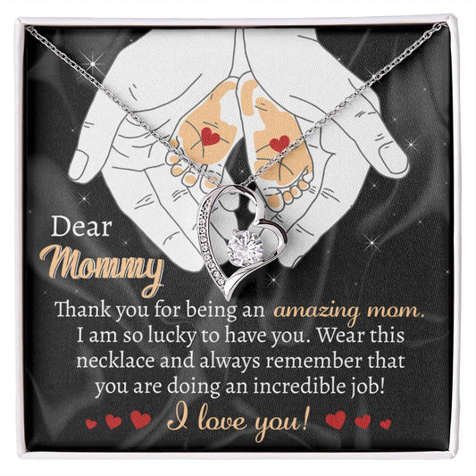 A To Mom To Be, An Incredible Job - Forever Love Necklace with a heart-shaped pendant and a message to mom on a fabric, with hands forming a heart symbol, is a perfect gift for mom.