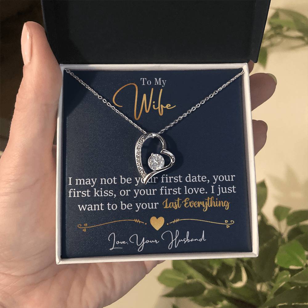 A heart-shaped cubic zirconia pendant necklace in a gift box with a message from husband to wife expressing a desire to be her last love, named the To My Wife, I Want To Be Your Everything - Forever Love Necklace.