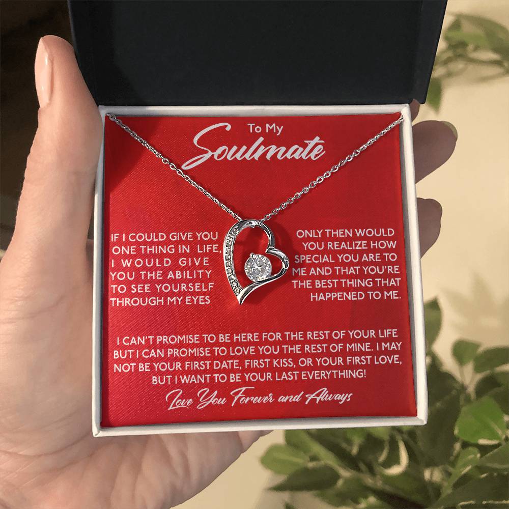 A hand holding an open jewelry box with a heart-shaped To My Soulmate, You Are Special To Me - Forever Love Necklace by ShineOn Fulfillment and a sentimental message to a soulmate.