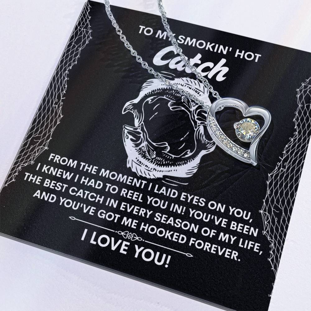 The Soulmate-Got Me Hooked - Forever Love Necklace features a heart-shaped pendant with a CZ crystal in a white gold finish. It comes on a romantically themed fishing card, symbolizing timeless love.